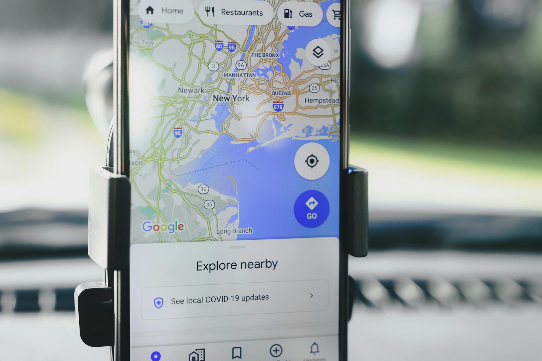 Close-up of Google Maps on a smartphone showing local business navigation