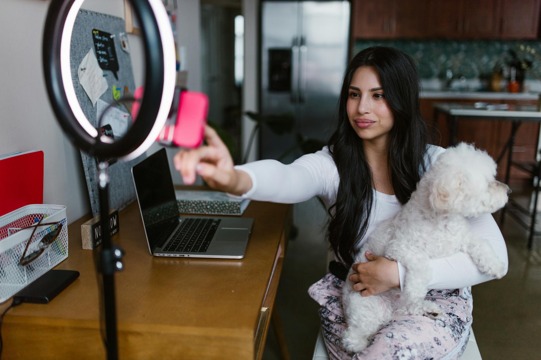 Woman with dog at a local business representing authentic local business ownership