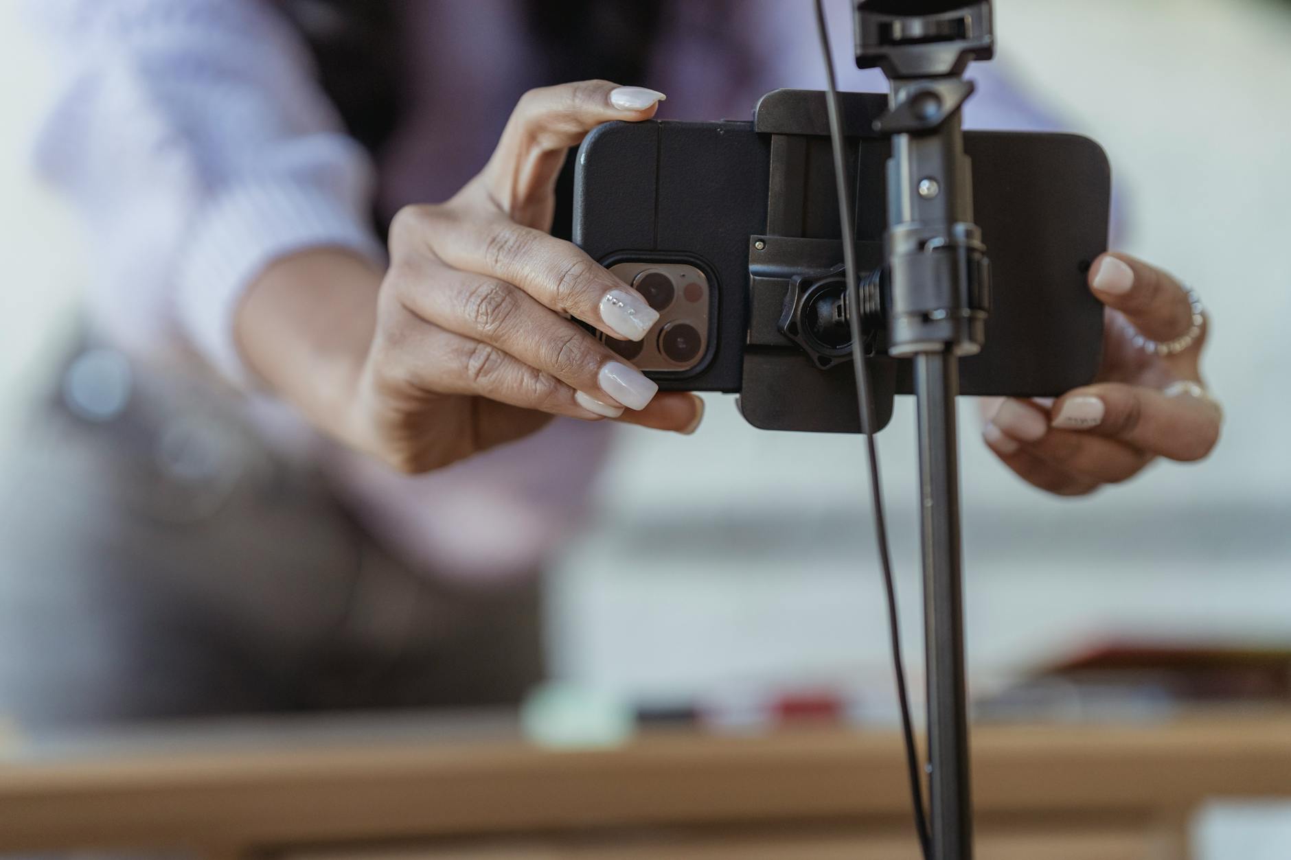 Small business owner filming a Reel on a smartphone for Instagram