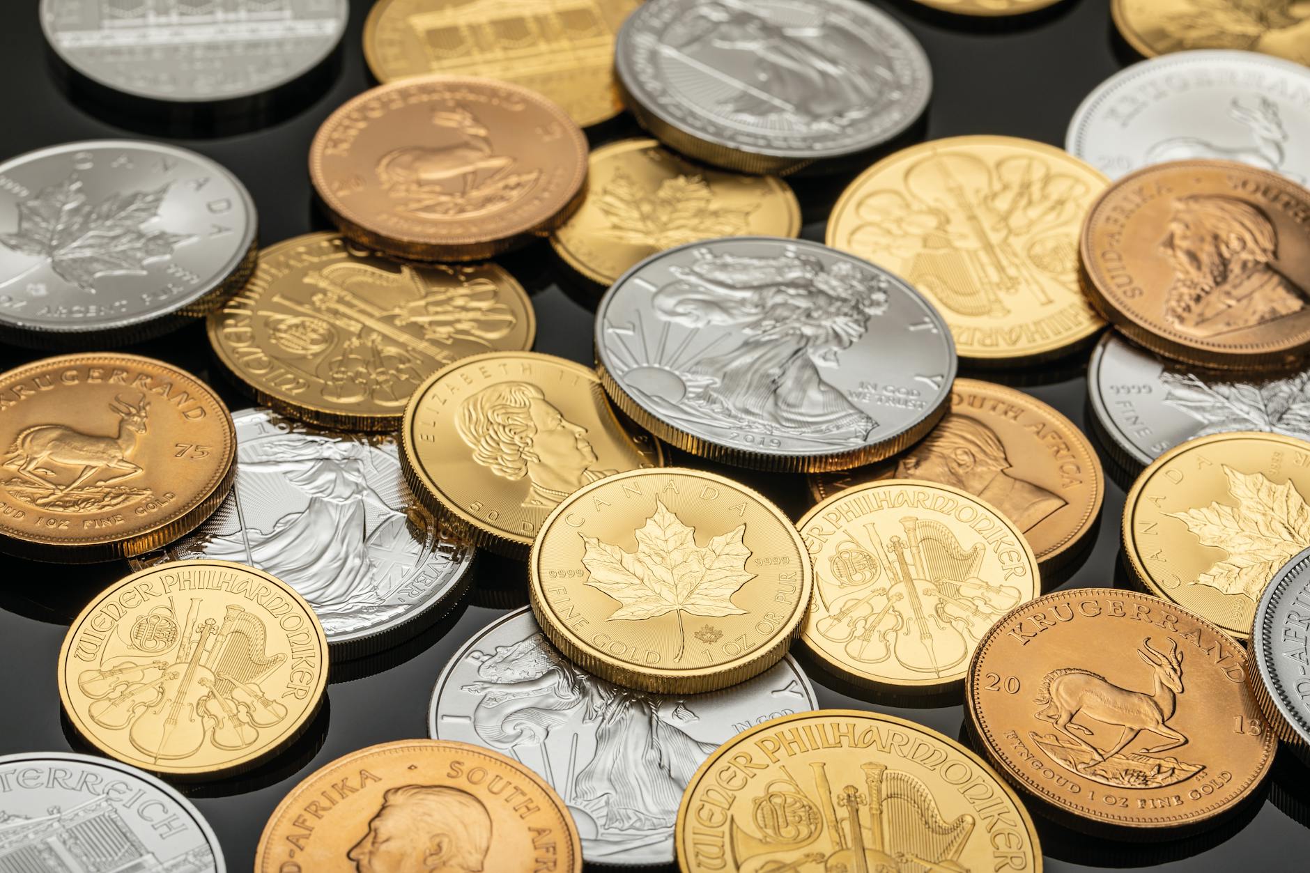 Silver coins and bars stored in a home safe with combination lock