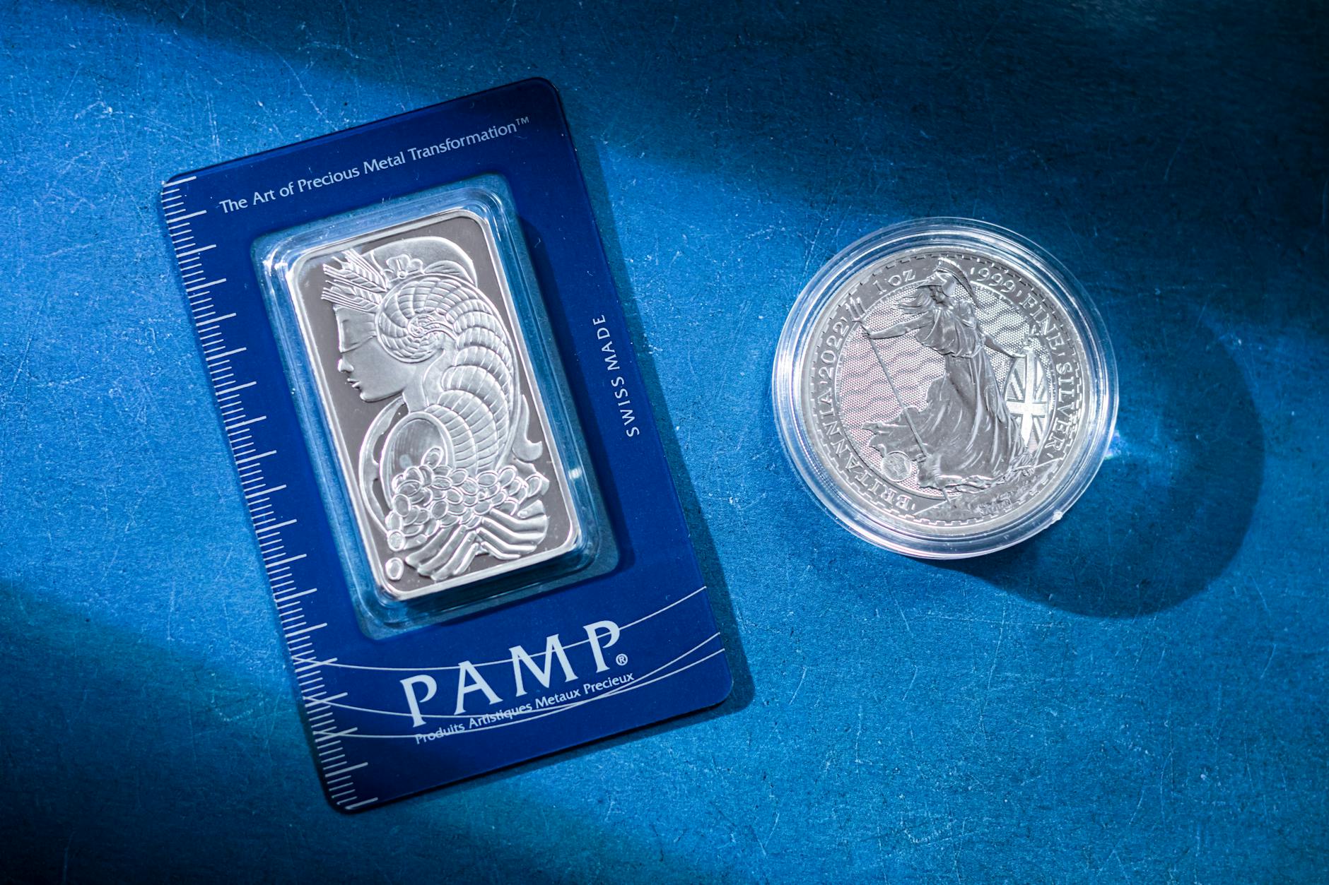 Silver bar and coin showing precious metal physical storage