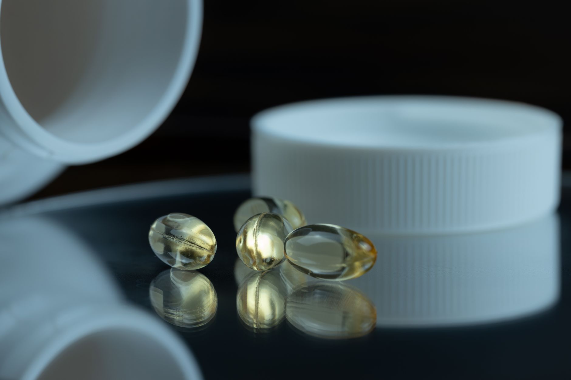 Gel capsules close up showing desiccant and protective container materials for humidity control